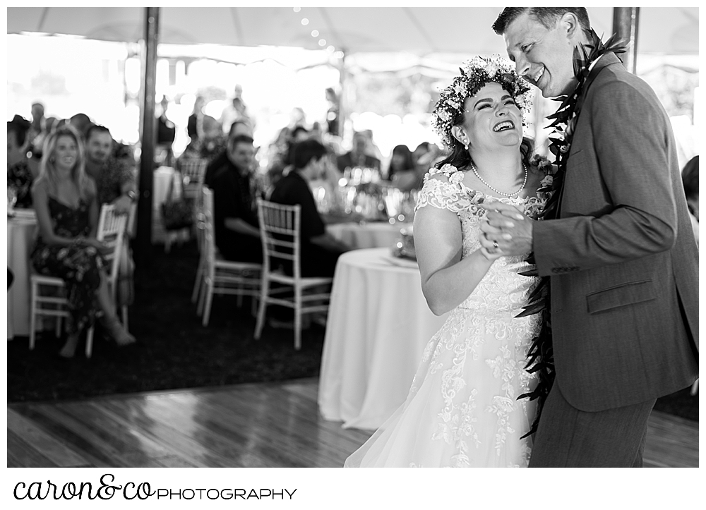 black and white photo of a bride and groom during their first dance at their Nonantum Resort tented wedding reception