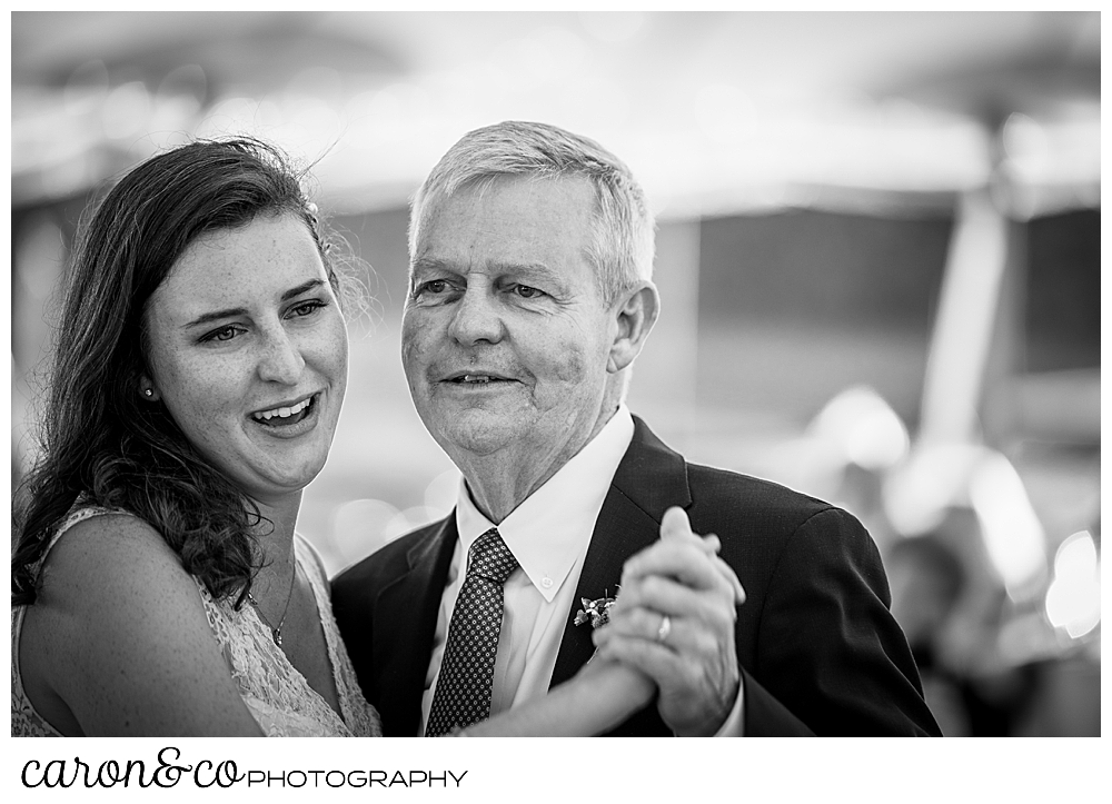 black and white photo of a bride dancing with her father during her Nonantum Resort wedding celebration