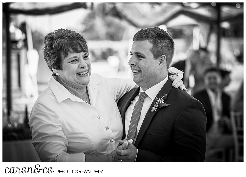 black and white photo of a groom dancing with is mother, during this Nonantum Resort wedding celebration