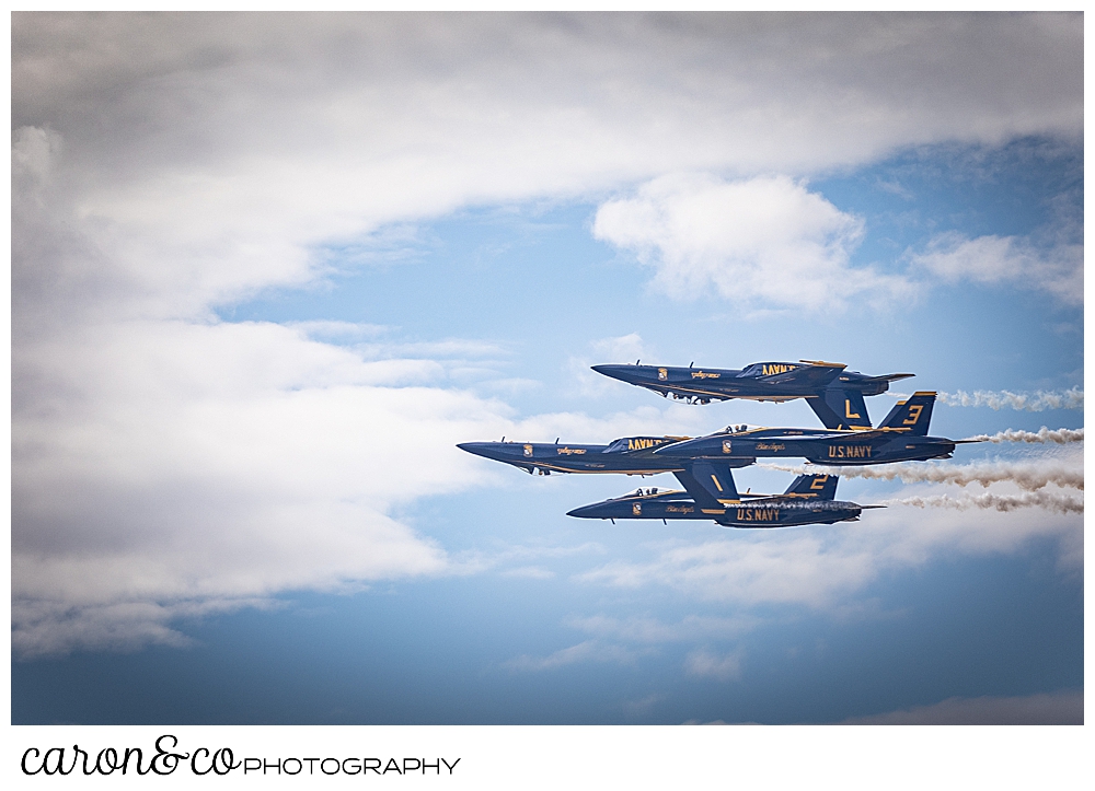 4 us navy blue angels fly together, 2 of them are upside down