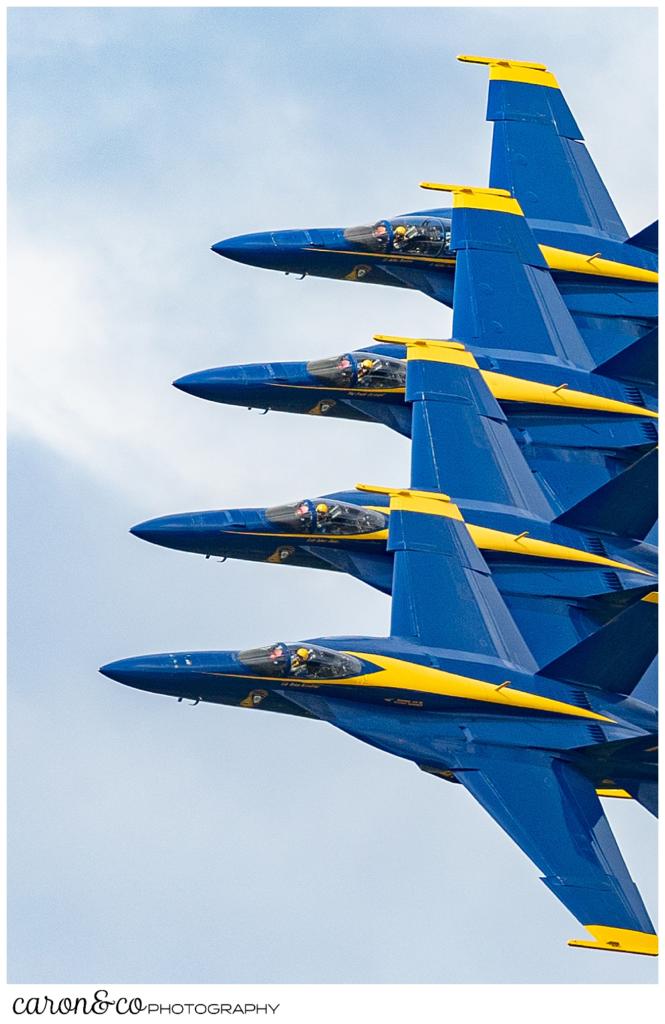 4 us navy blue angels fly in close formation at the Great State of Maine Airshow 2021, Brunswick, Maine