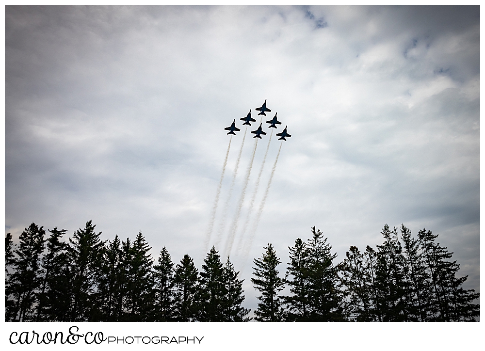 the US Navy Blue Angels, 6 planes flying in a tight group of 1 over two, over three