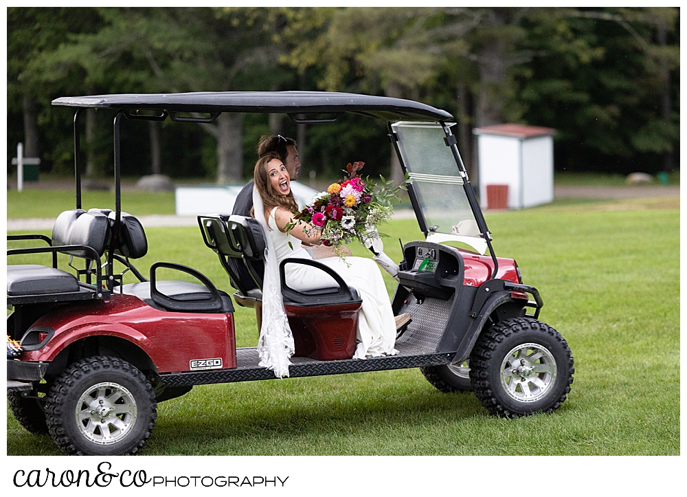 a bride smiles for the camera as she zips by in a golf cart