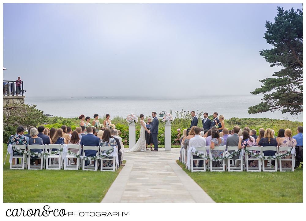 looking down the aisle at a Colony Hotel wedding ceremony, Kennebunkport Maine