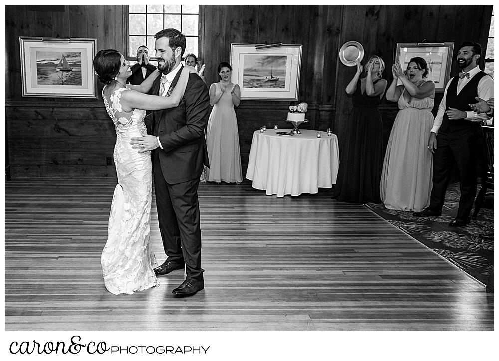 a black and white photo of a bride and groom dancing in the ballroom at the Colony Hotel, Kennebunkport, Maine