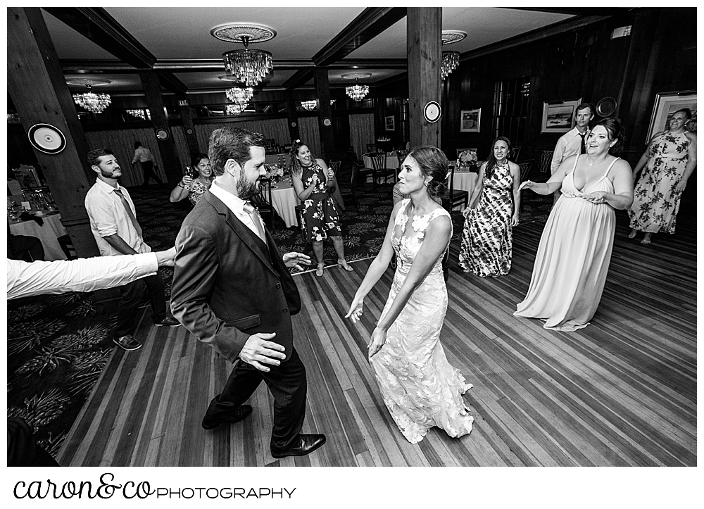 a black and white photo of a bride and groom on the dance floor at their coastal Maine wedding at the Colony Hotel Kennebunkport Maine