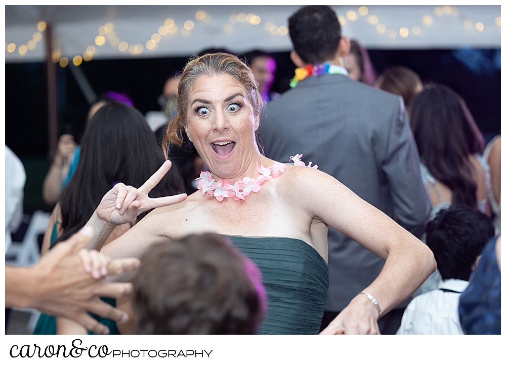 a bridesmaid dancing and having fun