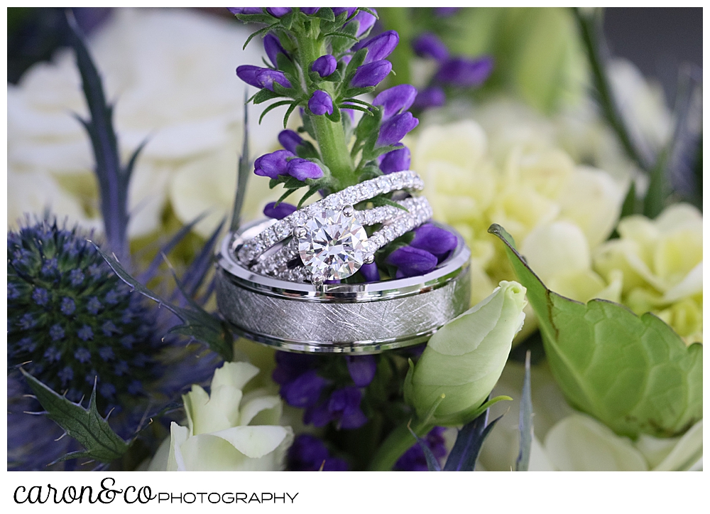 wedding ring details on the bride's bouquet of purple, green, and white