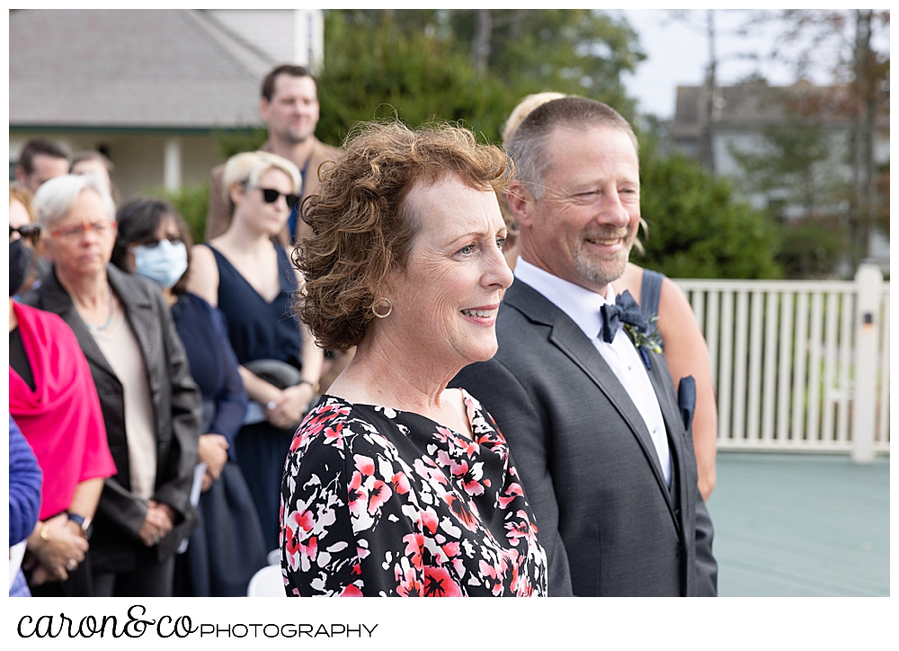 parents of the bride, watch the spruce point inn maine wedding ceremony on the deck