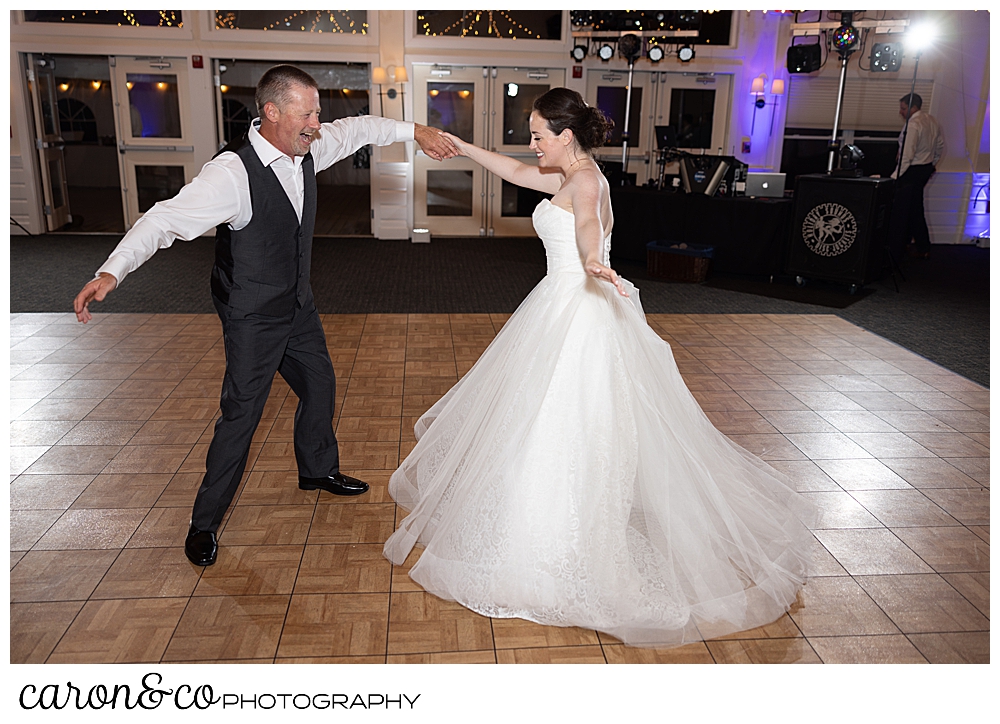 a bride and her father dance the father daughter dance at a Spruce Point Inn Maine wedding reception