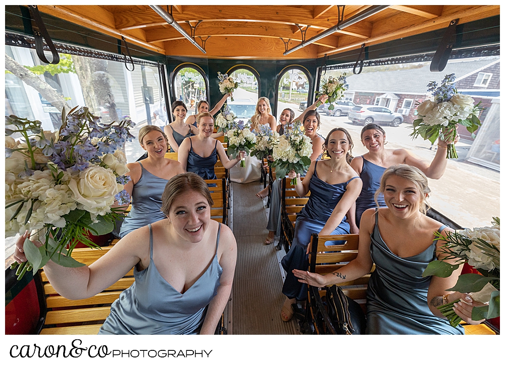 a bride and ten bridesmaids on the trolley, heading to the church