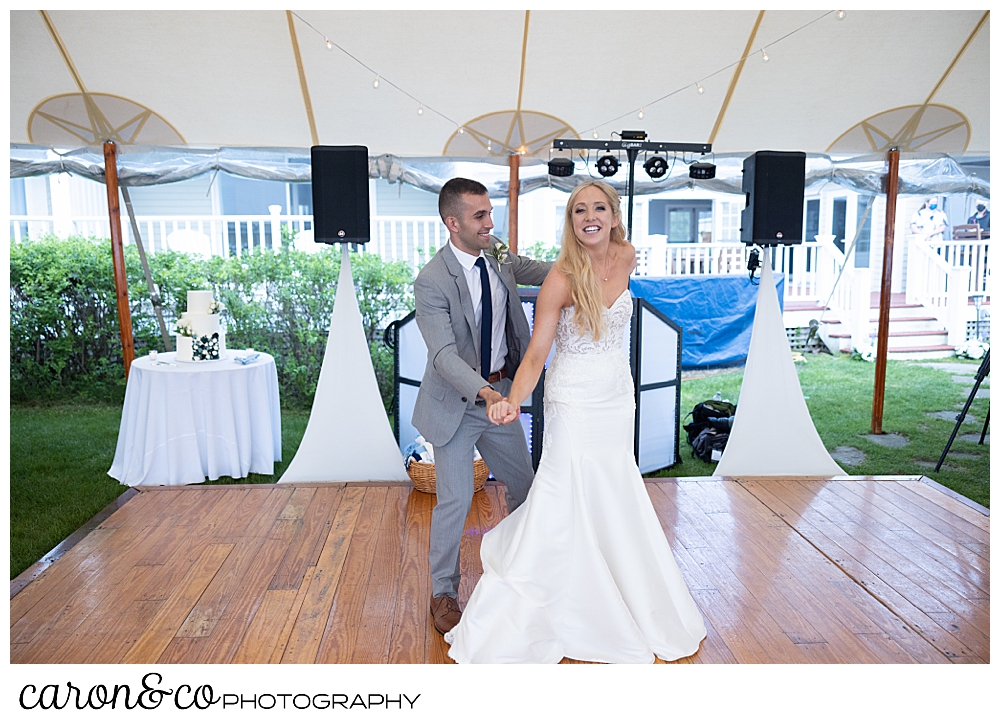 a bride and groom dance their choreographed first dance at a breakwater inn Kennebunkport wedding reception
