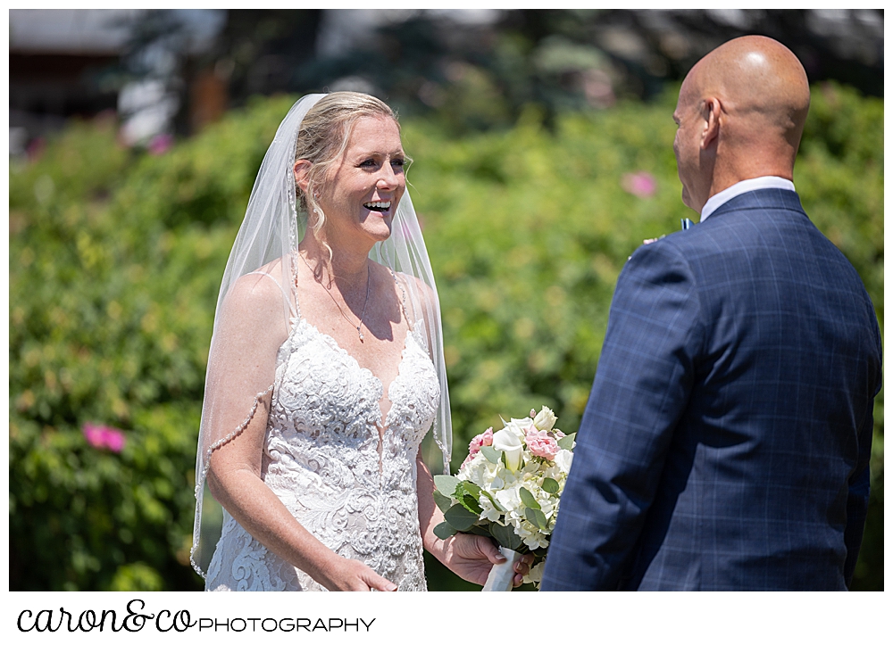 a bride and groom meet during a wedding day first look at their Kennebunkport Maine colony hotel wedding