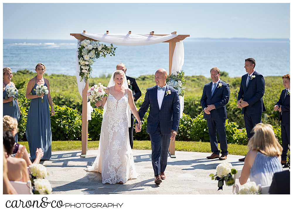 a bride and groom are married, and begin their recessional at a Kennebunkport Maine colony hotel wedding ceremony