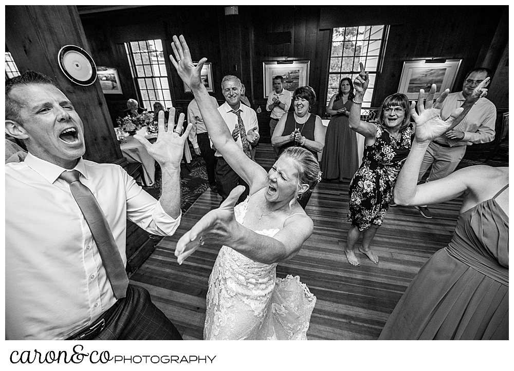 black and white photo of a bride and her guests dancing at the colony hotel Kennebunkport Maine
