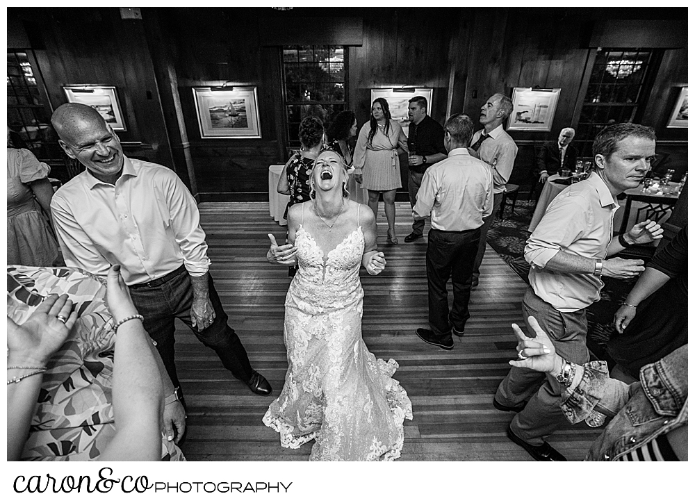 black and white photo of a bride dancing with her groom at a Kennebunkport Maine colony hotel wedding reception