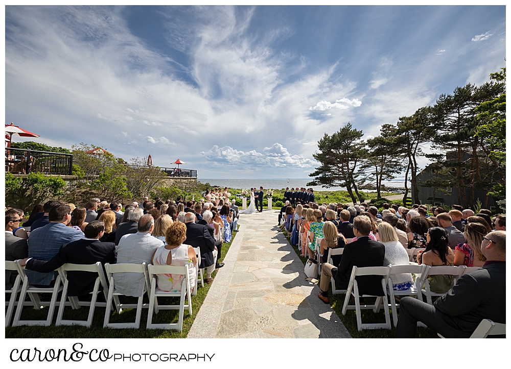 Looking down the aisle at an outdoor Kennebunkport Maine wedding at the colony hotel