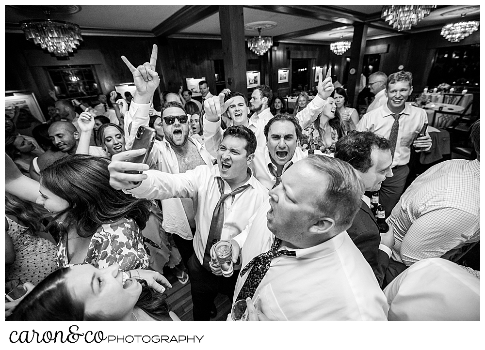 black and white photo of a guest taking a selfie on the colony hotel in Kennebunkport maine