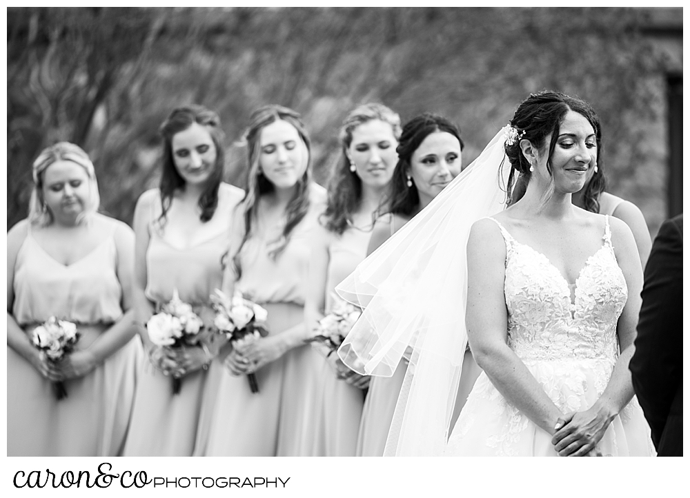 a bride and her bridesmaids during a colony hotel Kennebunkport wedding ceremony