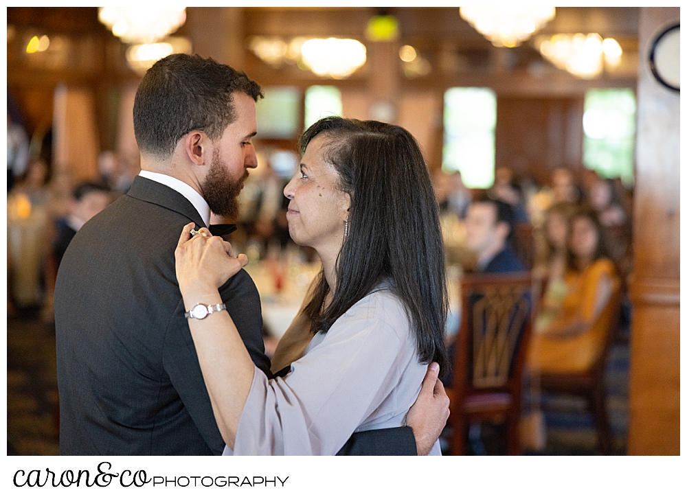 the groom dances with his mother