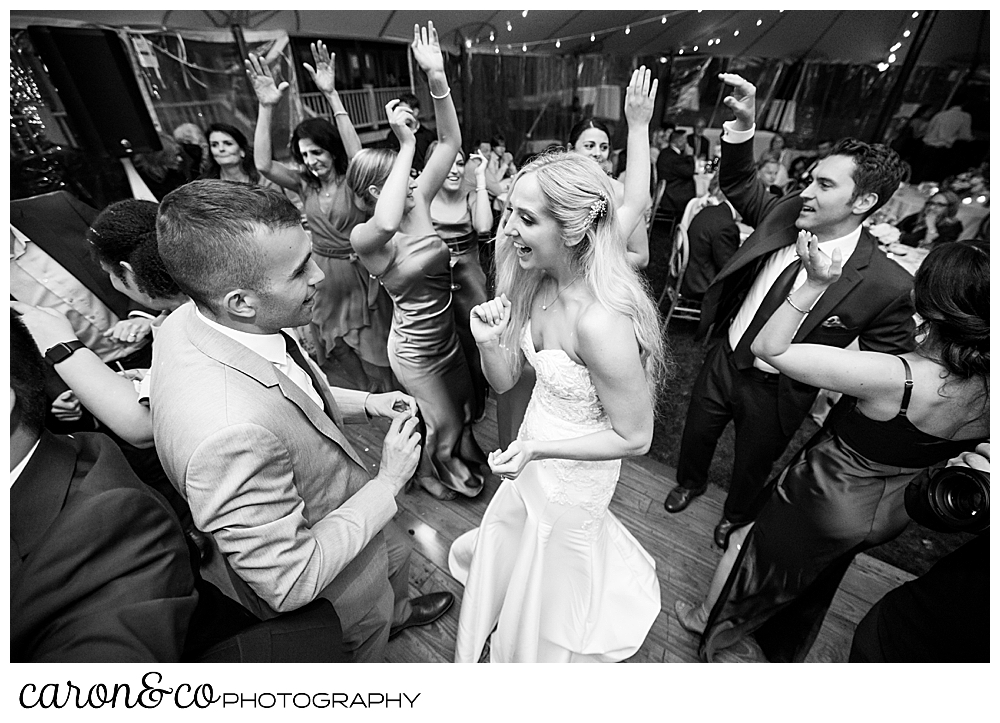 black and white photo of bride and groom dancing at their Breakwater Inn Kennebunkport Maine wedding tented reception